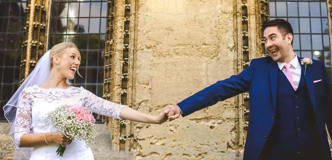 bride and groom smiling and laughing
