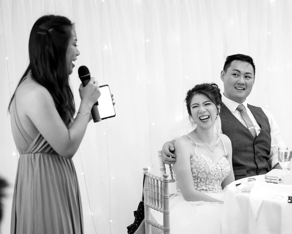 sister of the groom delivering her speech