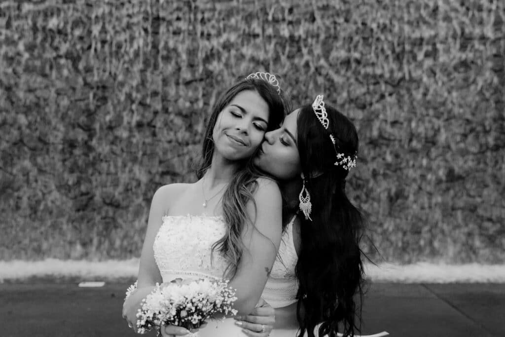 lesbian brides hugging