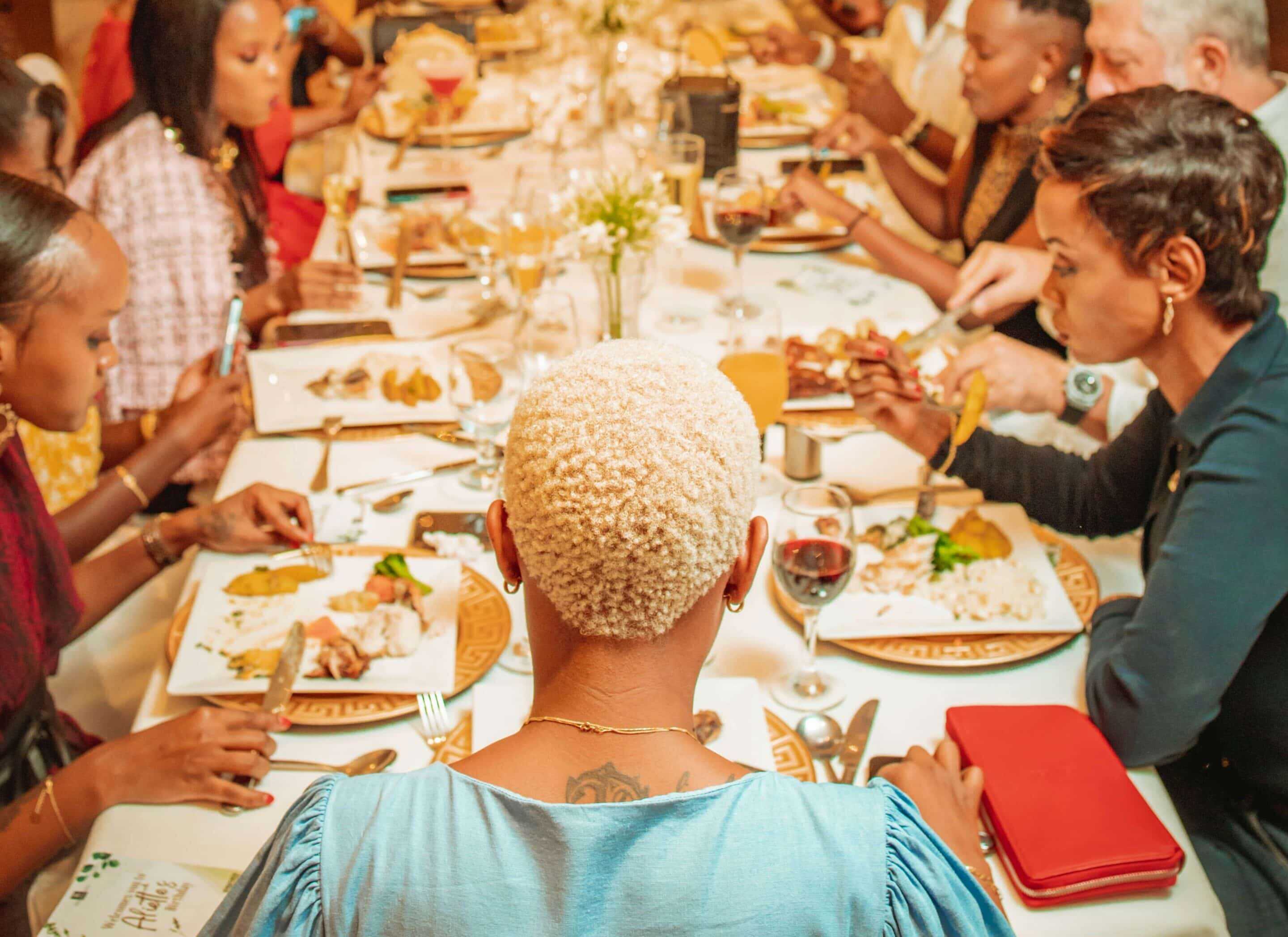 black woman at a dinner party