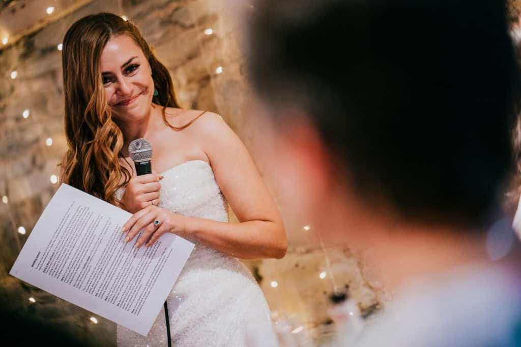 bride reading her speech from A4