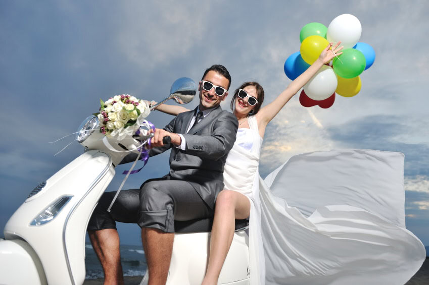 newlyweds smiling after delivering their wedding vows