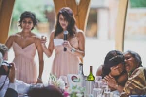 maids of honour delivering a joint wedding speech