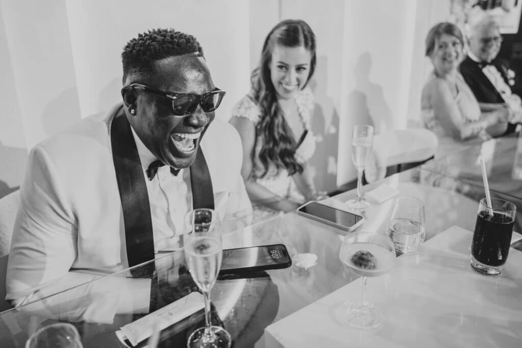 groom laughing at the best man icebreaker