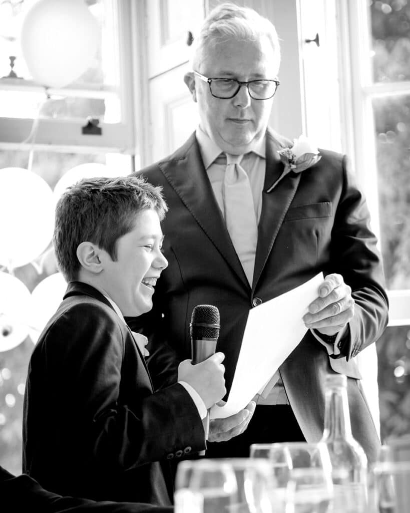 son of the bride laughing at his speech