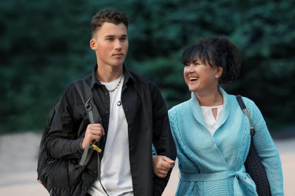 teenage son with his mother